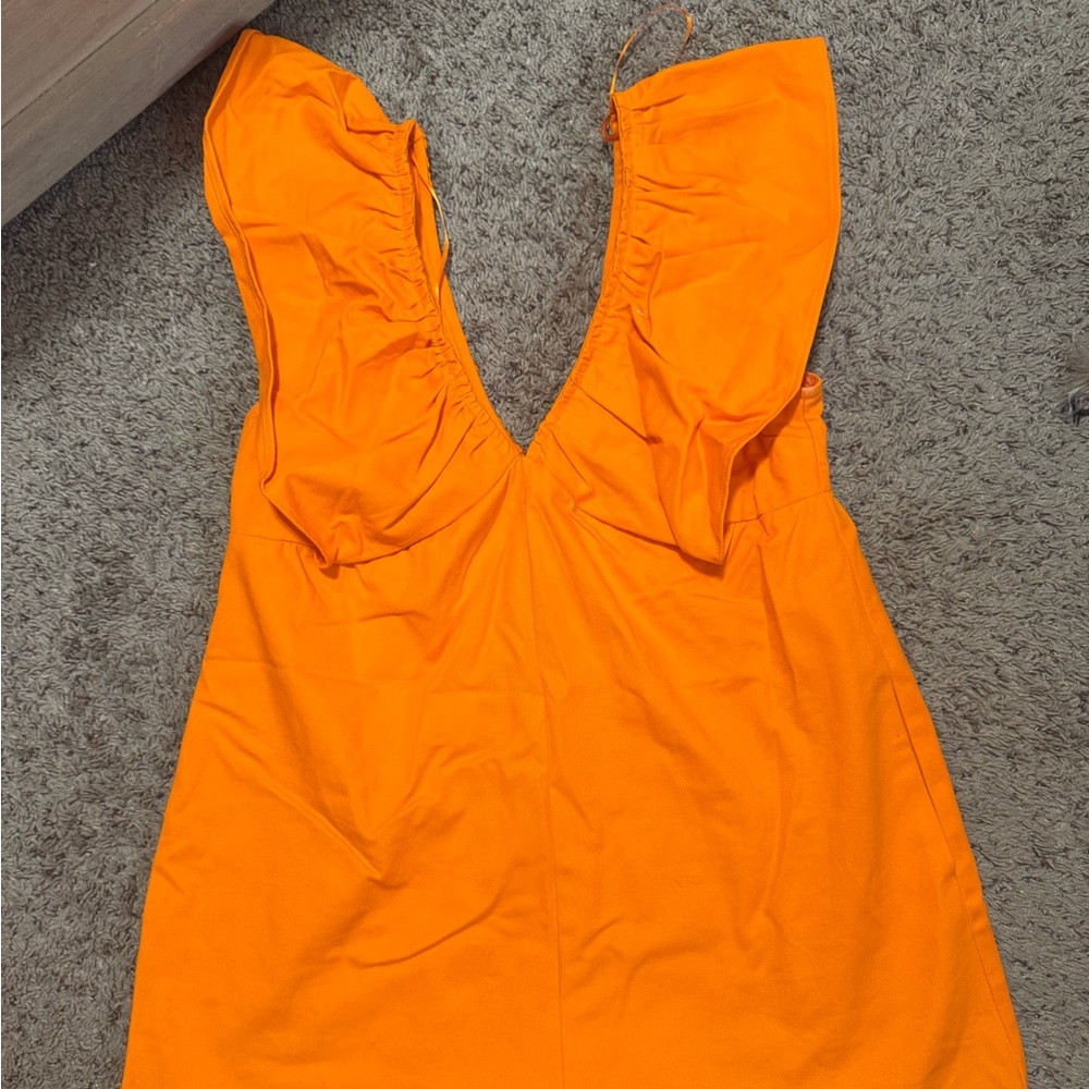 Orange romper worn 1 time!
